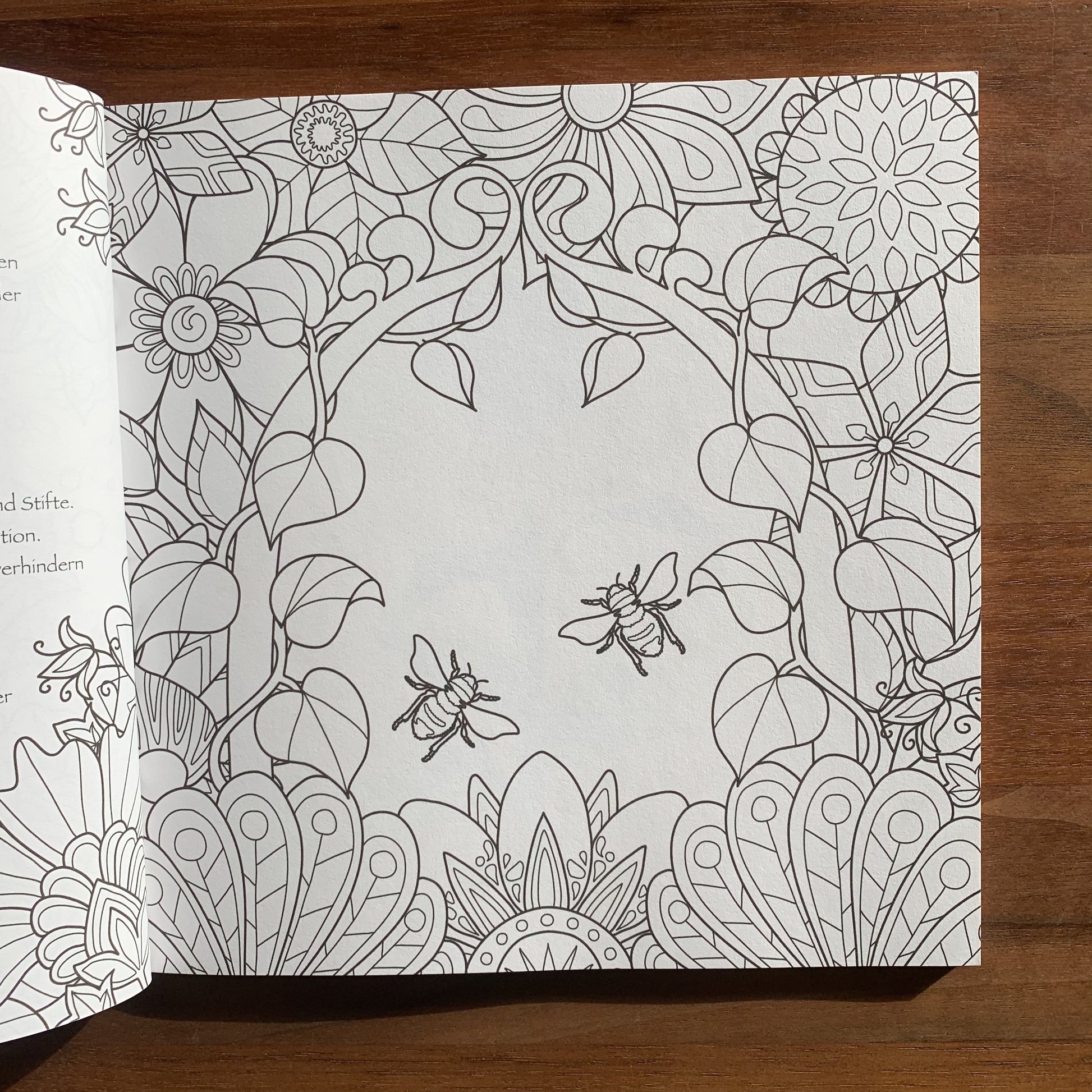 colouring page with flowers and bumble bees