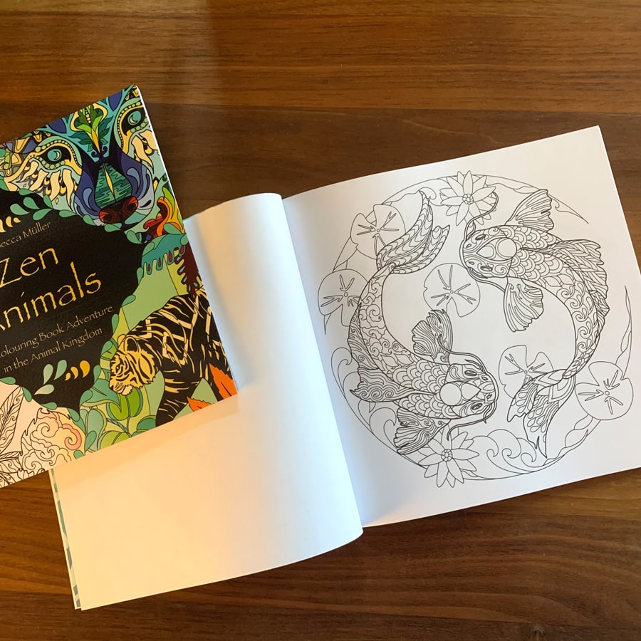 colouring page from the zen animals colouring book showing circling koi fish